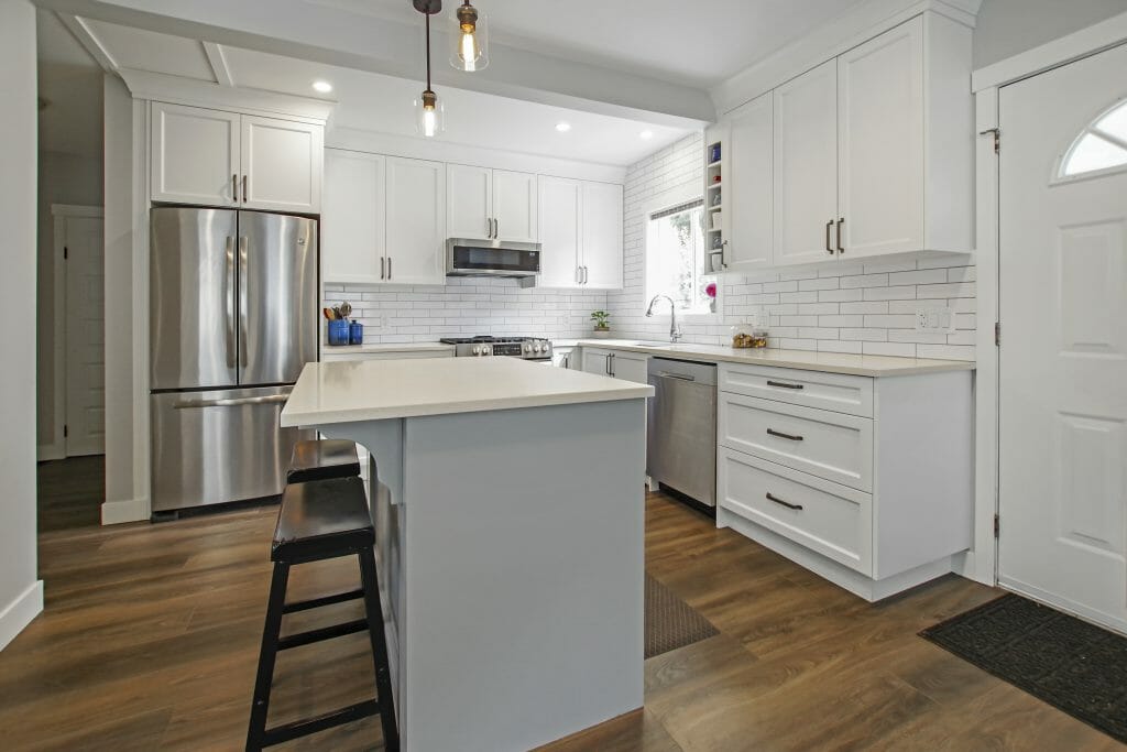 Panoramic view of a newly renovated kitchen.