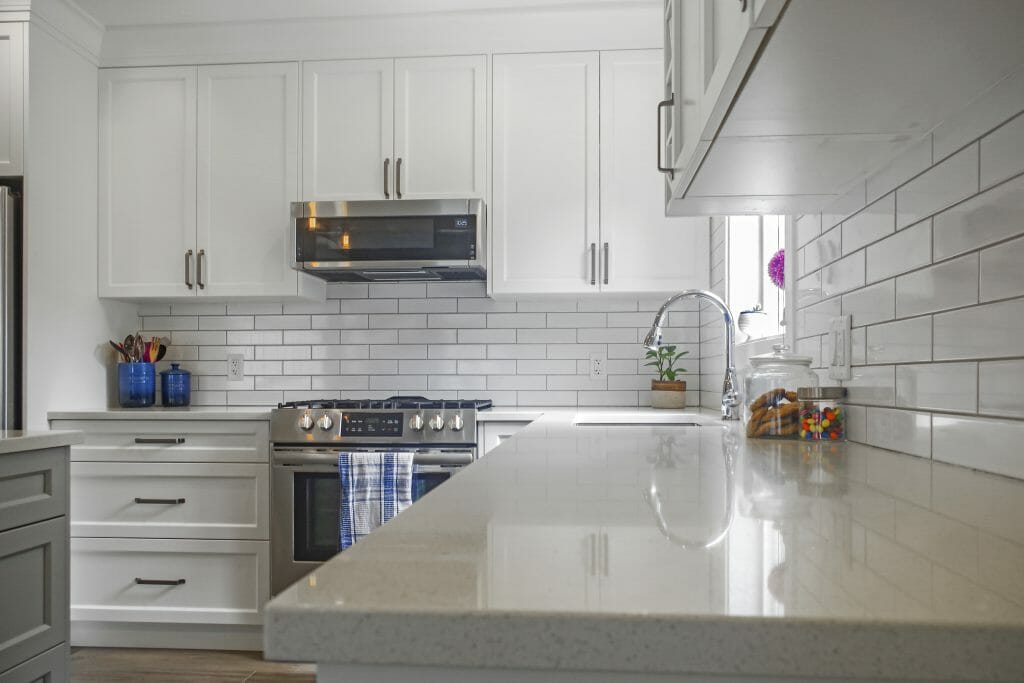 Closeup of a quartz countertop in a renovated kitchen.