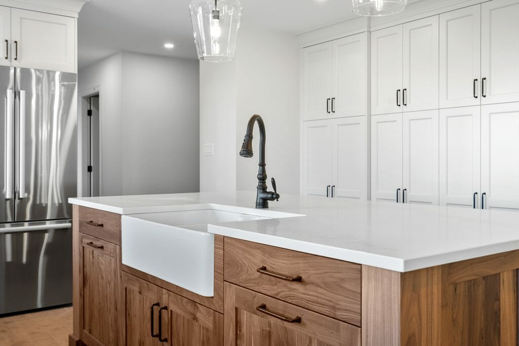Large kitchen island with under counter oversized sink.
