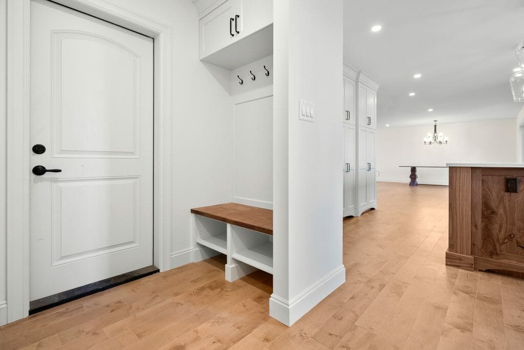 Newly renovated Mudroom entryway with storage for outerwear and shoes.